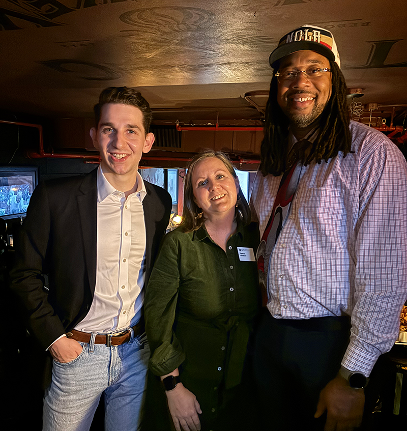 Alumni Director Cait Gladow, center, with alumnus Ben Pincus (left) and alumnus Norbert Lewis (right)