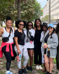 Maternal and Child Health students posing for a picture outdoors in downtown New Orleans