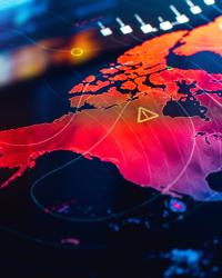 image of a map of North America with hazard triangles imposed over areas suggesting possible security risk